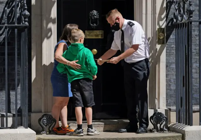 Ilmarie Braun and her son Thomas delivering the petition