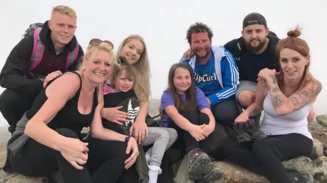 Jane Slater and Darren Laurie with their family