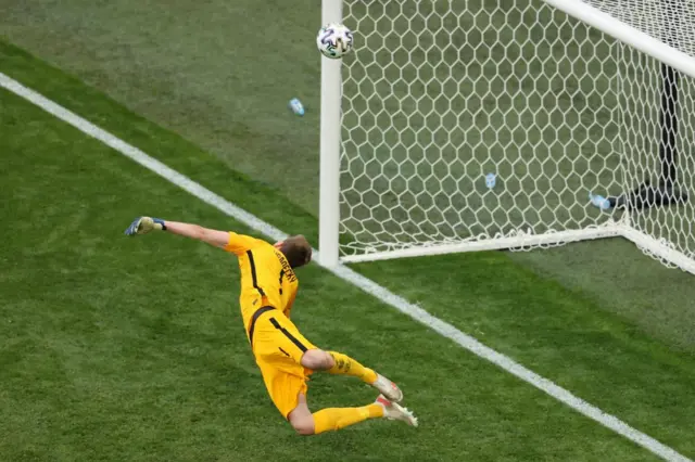 Finland keeper attempt to save the Russian goal