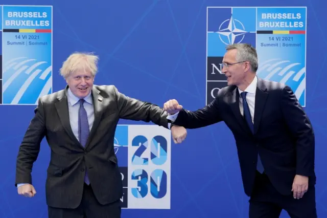 Nato Secretary General Jens Stoltenberg welcoming Boris Johnson to the summit on Monday