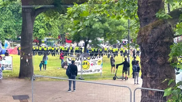 Police at the Lovedown camp on Shepherds Bush Green