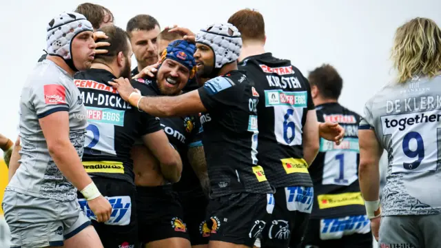 Exeter celebrate try