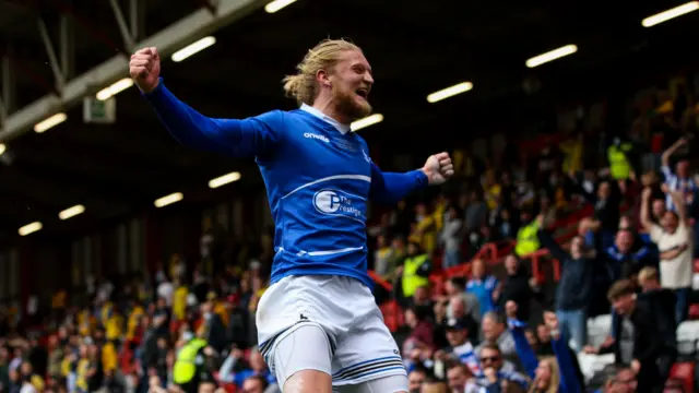 Luke Armstrong celebrates