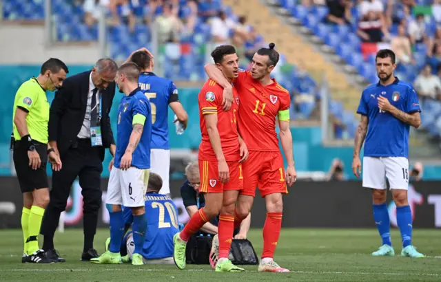 Gareth Bale consoles Ethan Ampadu after his red card