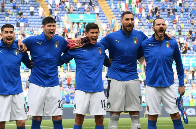 Italy players sing their anthem