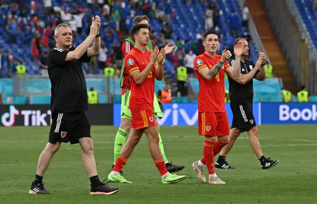 Wales players applaud the fans in Rome