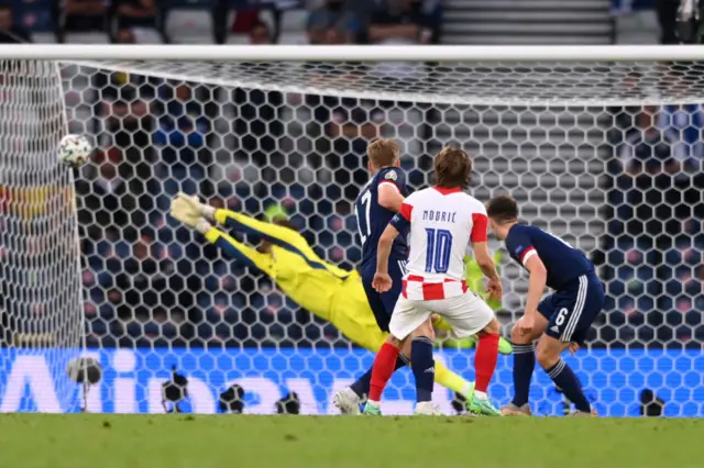 Luka Modric watches as his shot puts Croatia 2-1 ahead