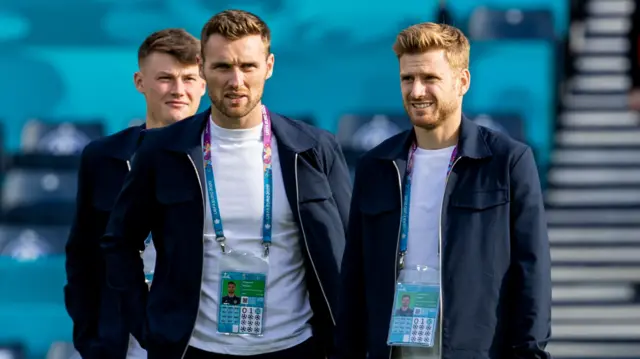 Stephen O'Donnell, Stuart Armstrong and Nathan Patterson go for a stroll on the Hampden turf