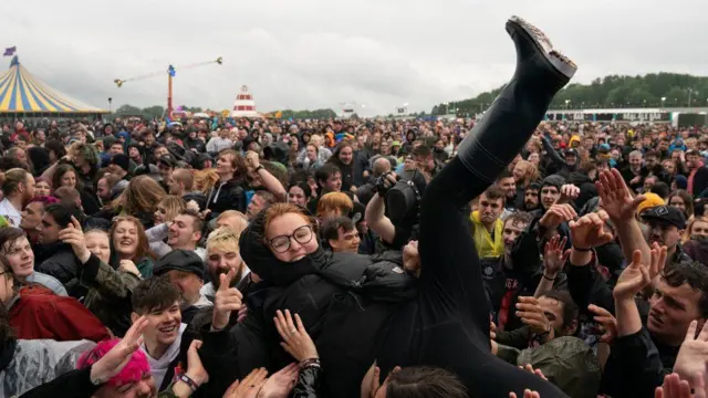 A picture of someone crowd surfing at Download Festival