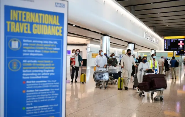 International travellers arriving at Heathrow airport