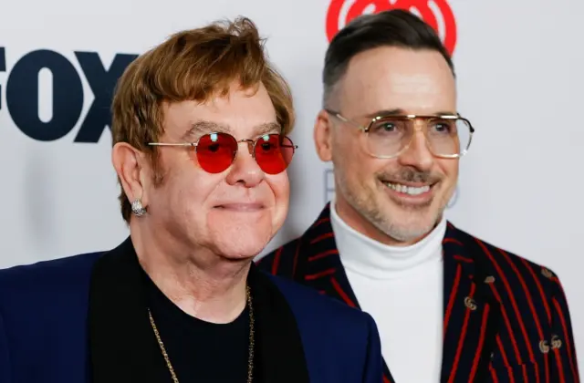 Sir Elton John and David Furnish at the 2021 iHeartRadio Music Awards last month