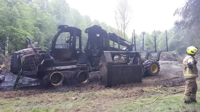 Burnt out agricultural machine