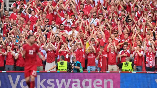 Denmark fans applaud the team following defeat in the UEFA Euro 2020 Championship Group B match between Denmark and Belgium at Parken Stadium