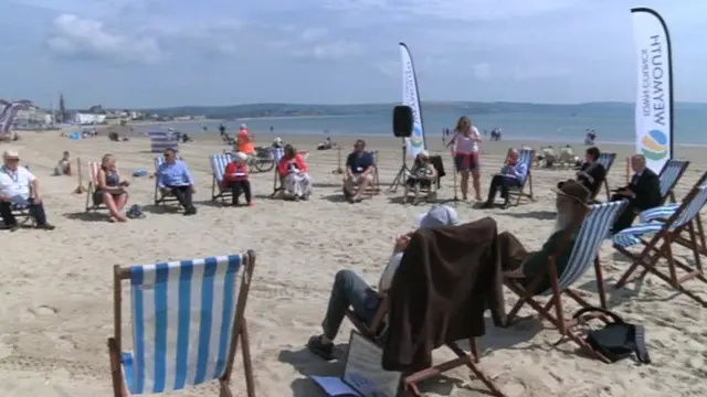 Weymouth Town Council meeting at a beach