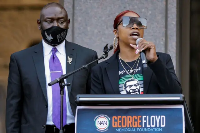 George Floyd"s sister, Bridgett Floyd speaks onstage next to Floyd family attorney Ben Crump during the "One Year, What"s Changed?" rally