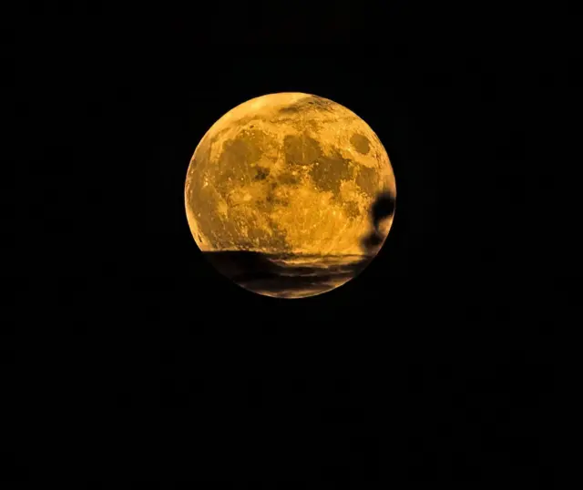 Strawberry moon over Bulwell, in Nottingham