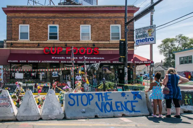 Across town, residents paid their respects at the Floyd memorial that went up at the site where he died