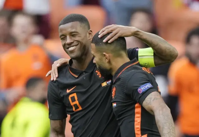 Georginio Wijnaldum and Memphis Depay celebrate a goal for the Netherlands