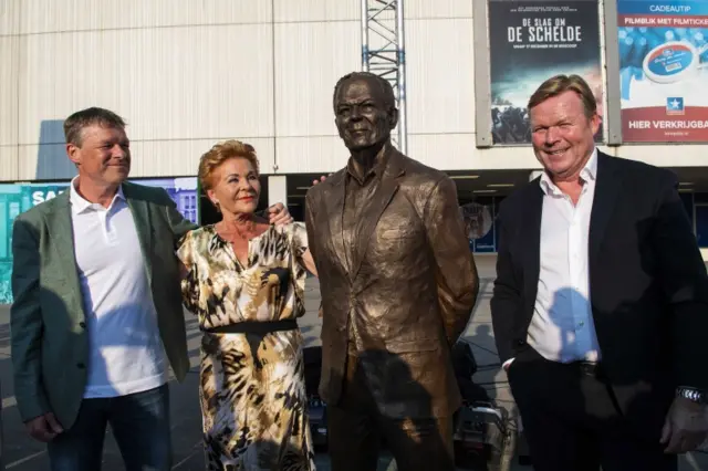 Erwin and Ronald Koeman attending the unveiling of a statue dedicated to their father, former Dutch player Martin Koeman, in Groningen