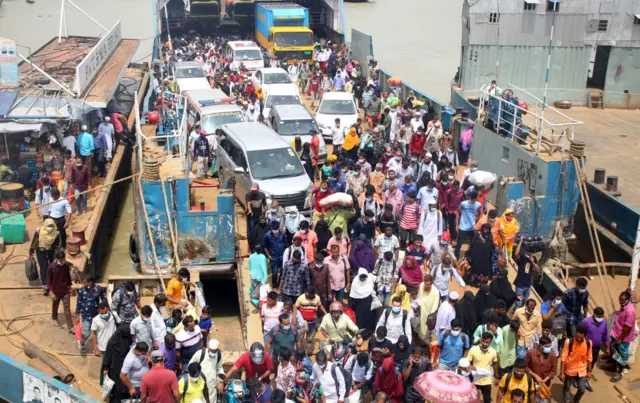 Rush of travellers at Shimulia ferry terminal in Dhaka, Bangladesh, on 26 June 2021