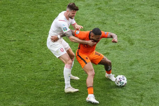 Czech defender holding off Depay