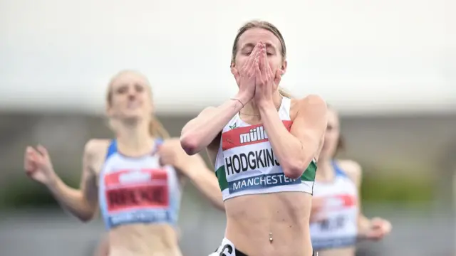 Keely Hodgkinson looks shocked, with her hands over her mouth, after winning the women's 800m