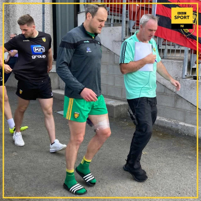 Michael Murphy with his injured hamstring being iced