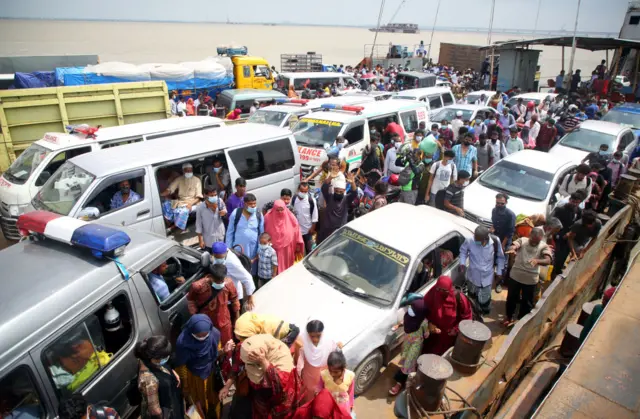 Rush of travellers at Shimulia ferry terminal in Dhaka, Bangladesh, on 26 June 2021