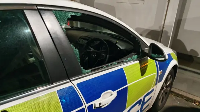 The car with a smashed window