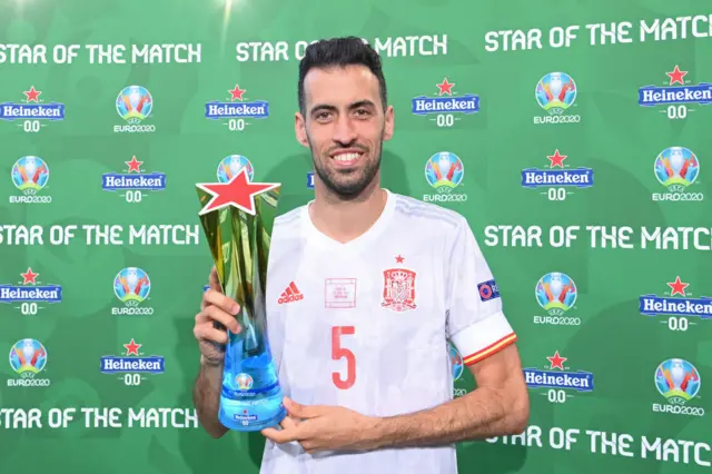 Busquets with star of the match trophy