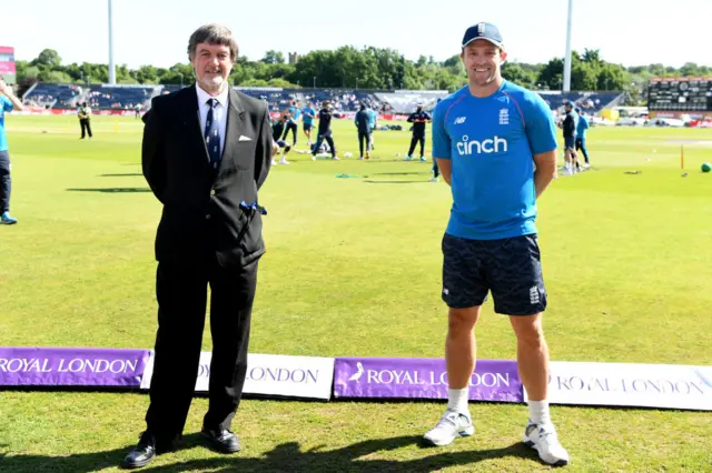 Former England player Peter Willey presents David Willey with his 50th ODI cap