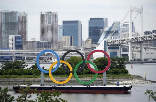 A giant Olympic rings monument is seen at Odaiba Marine Park in Tokyo, Japan, on 12 May 2021