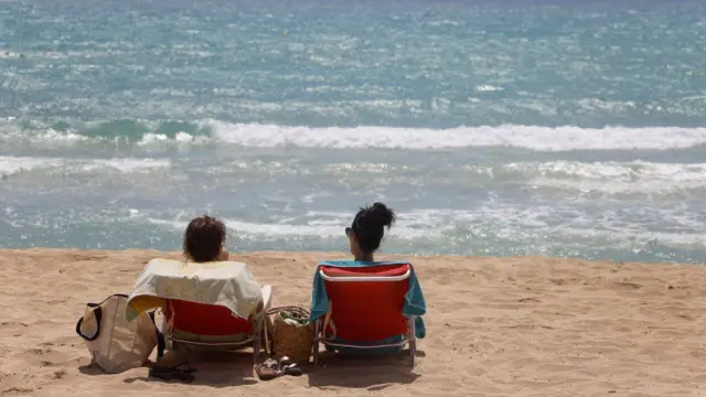 Two people on a beach