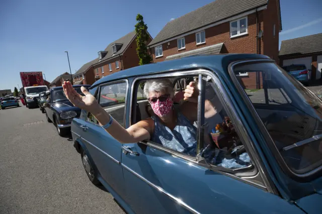 A fleet of cars built in Coventry burst with Bollywood, Caribbean and Irish dancers during Coventry Moves