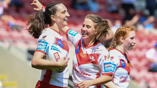 Rachael Woosey celebrates at try for St Helens