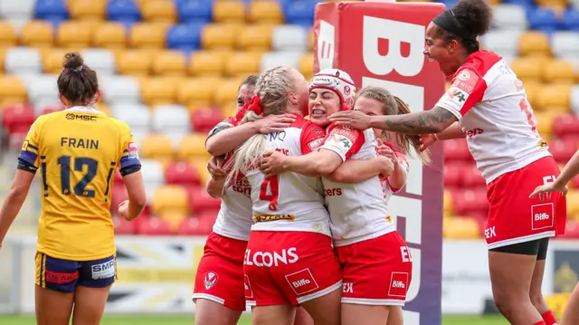 St Helens players celebrate a try