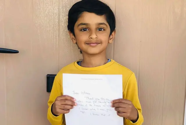 Ishaan with Sir David's letter