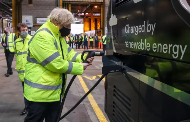 Boris Johnson and en electric bus in coventry