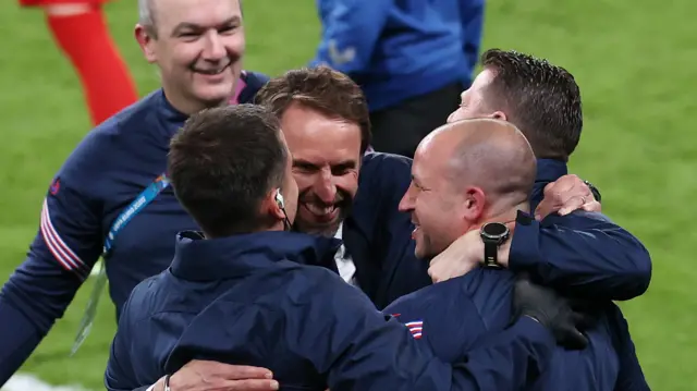 Gareth Southgate celebrates with his backroom staff