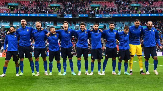 Italy players singing the national anthem