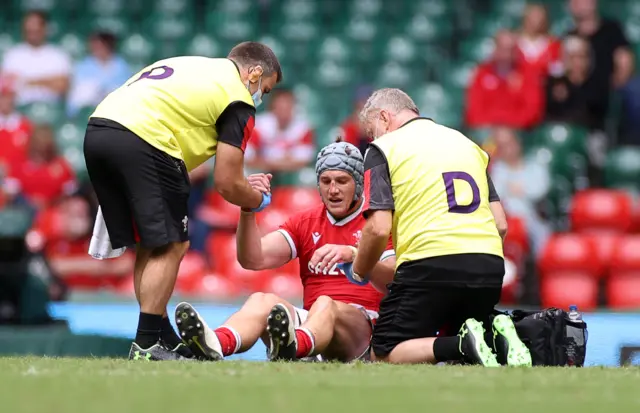 Wales captain Jonathan Davies gets treatment