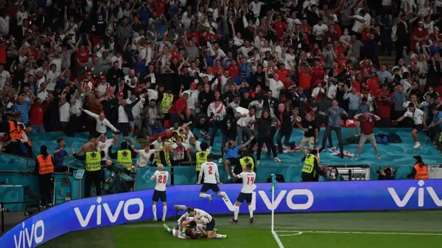 England players and fans celebrate