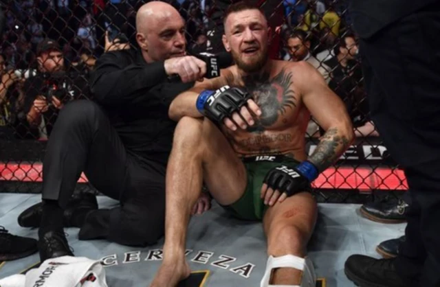 Conor McGregor speaks to Joe Rogan after losing to Dustin Poirier at UFC 264