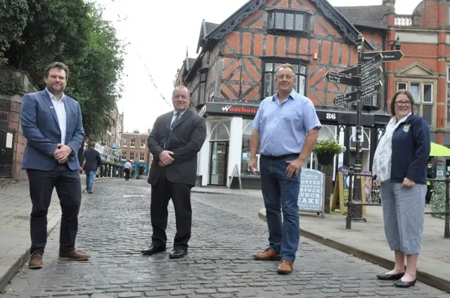 Seb Slater (Shrewsbury BID); Steve Brown; Councillor Steve Charmley (Shropshire Council), and Helen Ball (Shrewsbury Town Council) on High Street in Shrewsbury