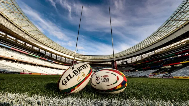 Rugby balls in front of the posts at Cape Town stadium