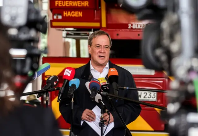 Armin Laschet speaks during a visit to firefighters in North Rhine-Westphalia