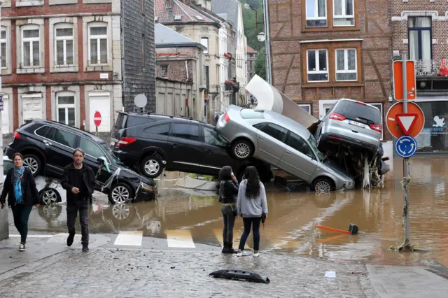 Cars stack on each other after flooding in Belgium