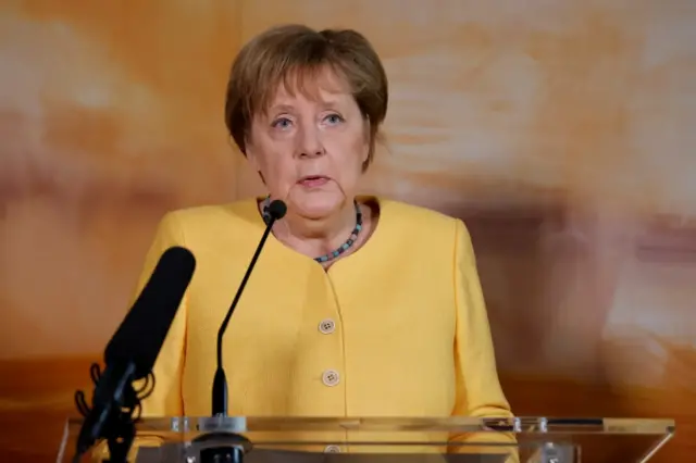 German Chancellor Angela Merkel delivers a statement at the German ambassador's residence in Washington