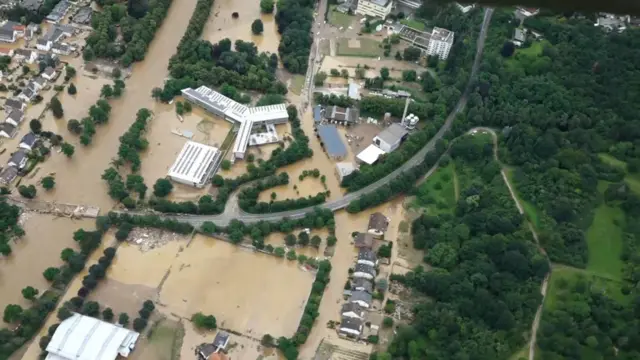 Aerial video grab view taken on July 15, 2021 from a video footages shows flooded properties, houses and landscapes after heavy rainfall