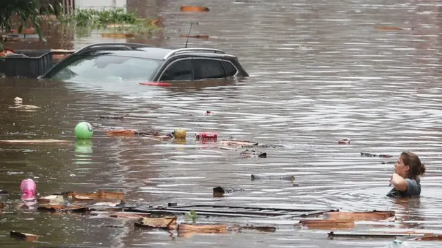 Cars are submerged in the Belgian city of Liege